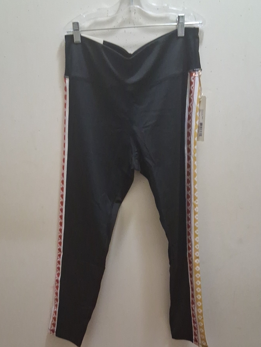 NWT Women C&C California Black Leggings with Red and Yellow Side Trim.